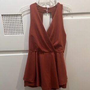 Salmon pink Romper with hidden shorts.